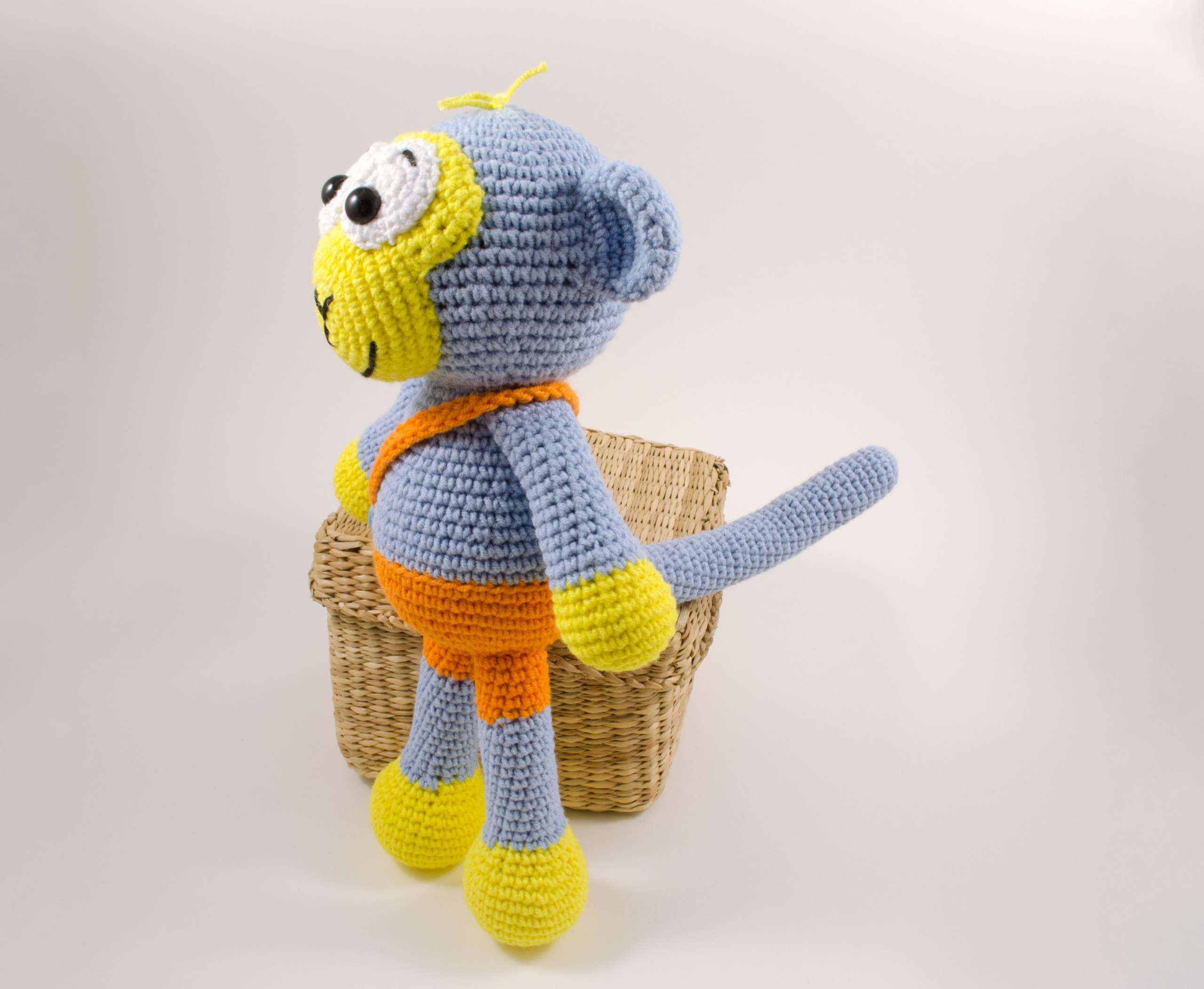 amigurumi blue monkey side view