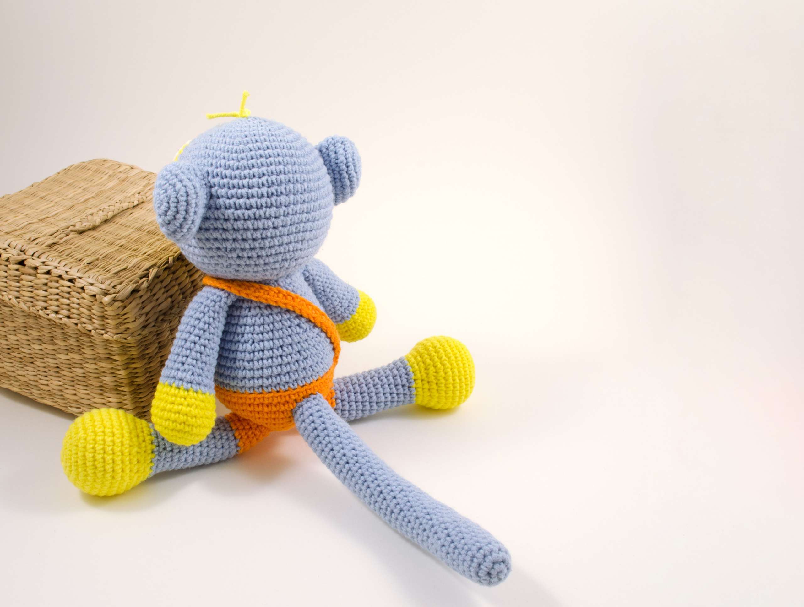 amigurumi blue monkey back view
