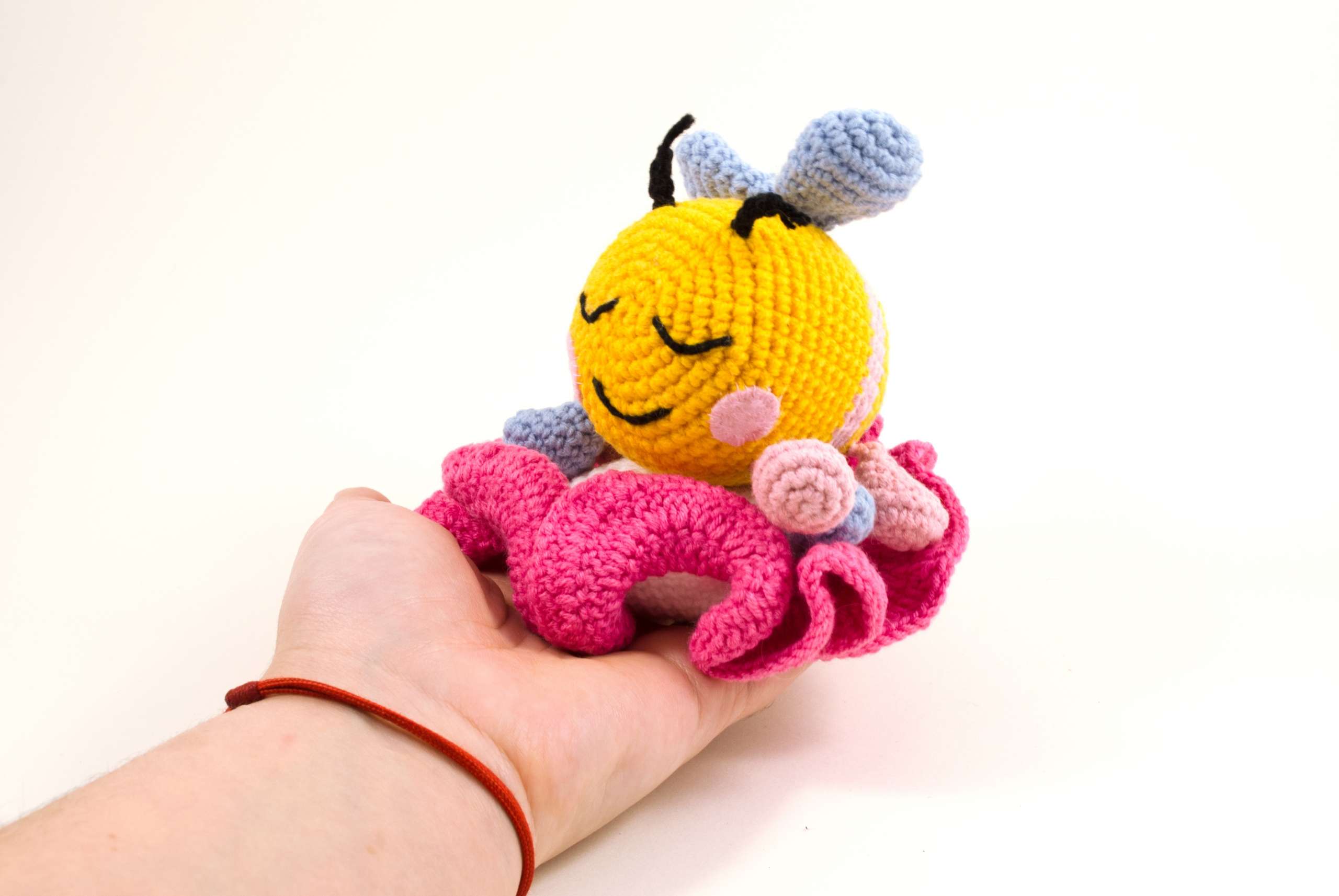 amigurumi bibi the bee on a flower
