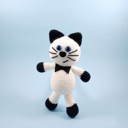 crochet black and white cat front view