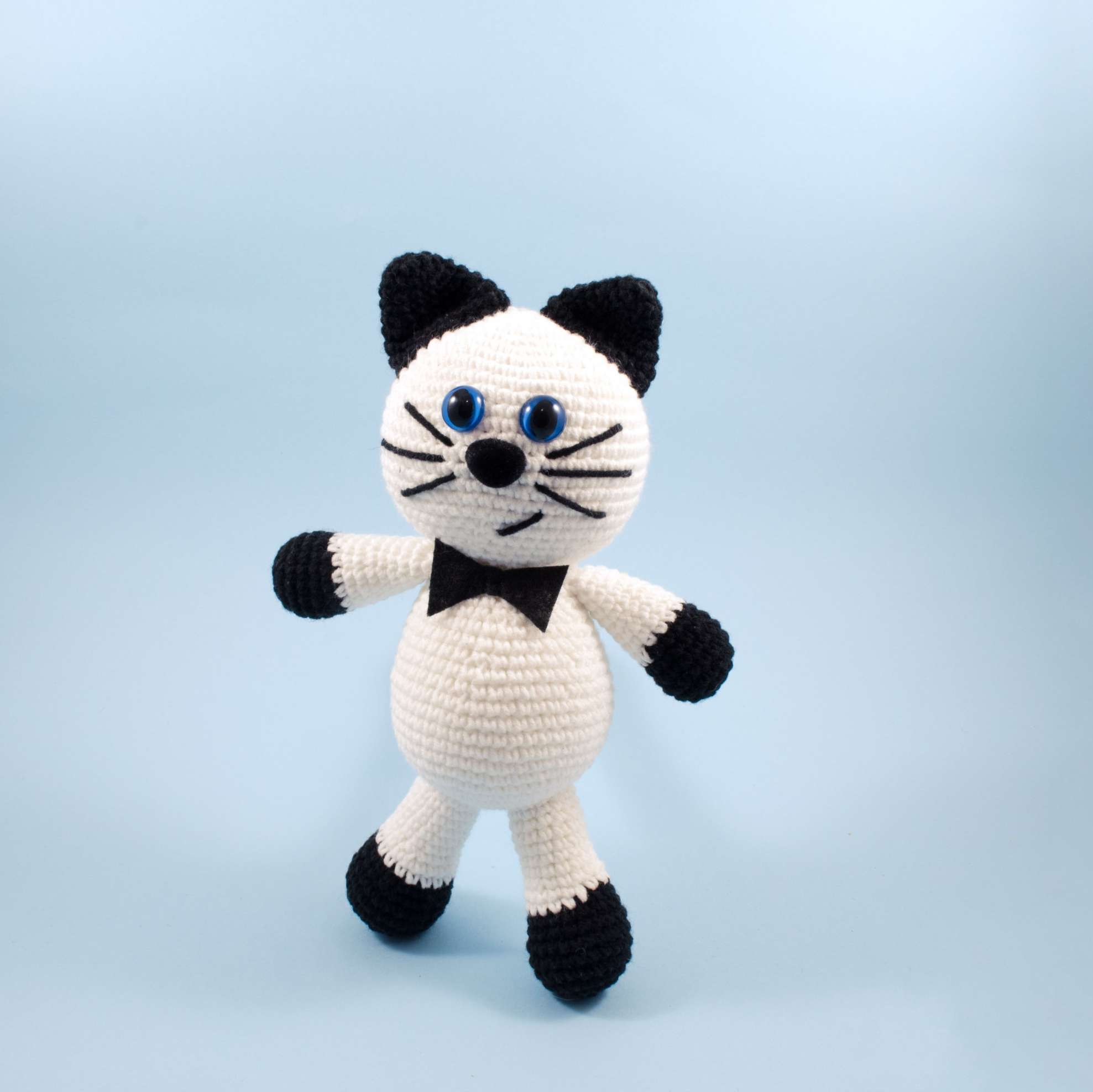 crochet black and white cat front view