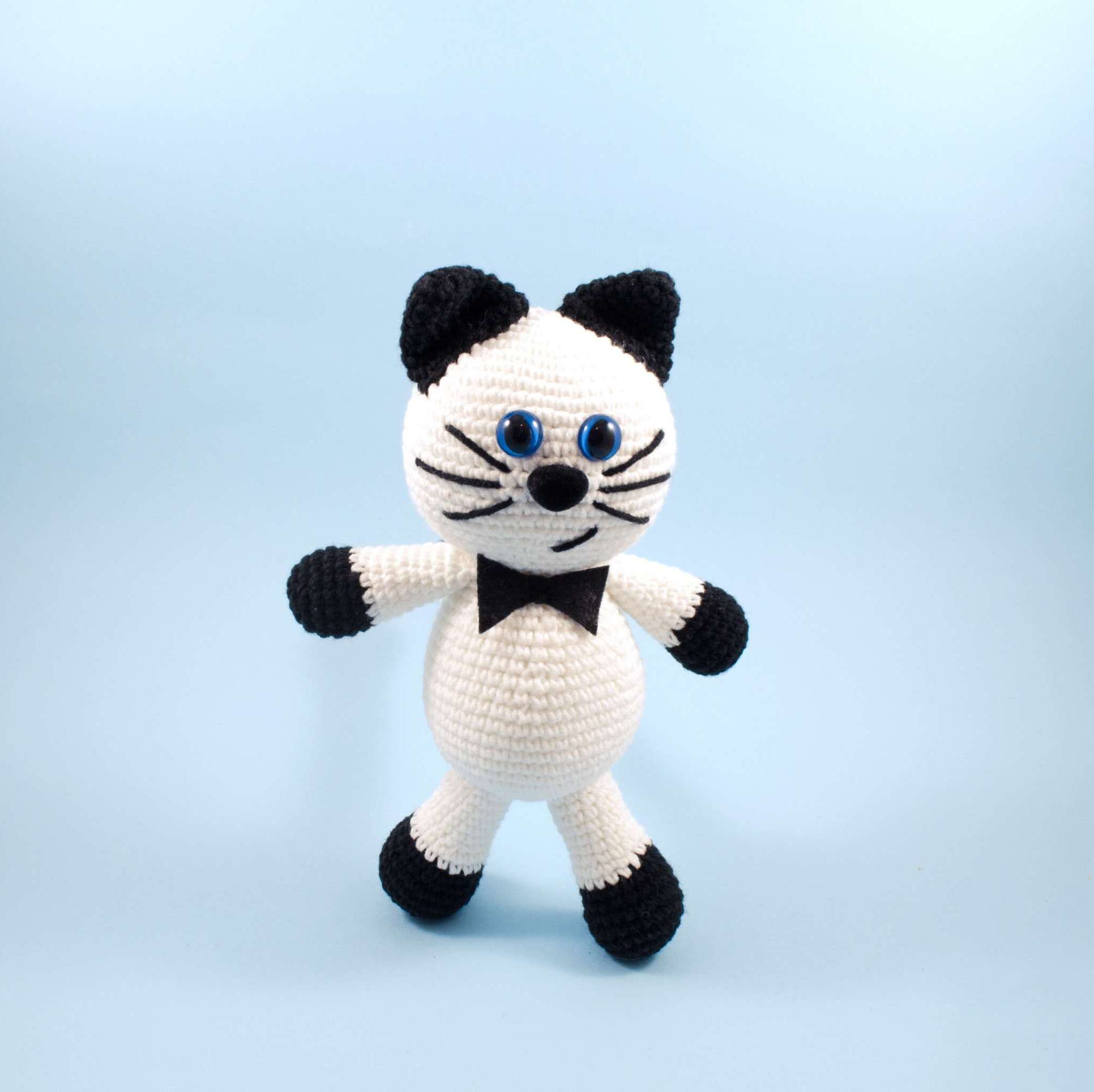 crochet black and white cat front view