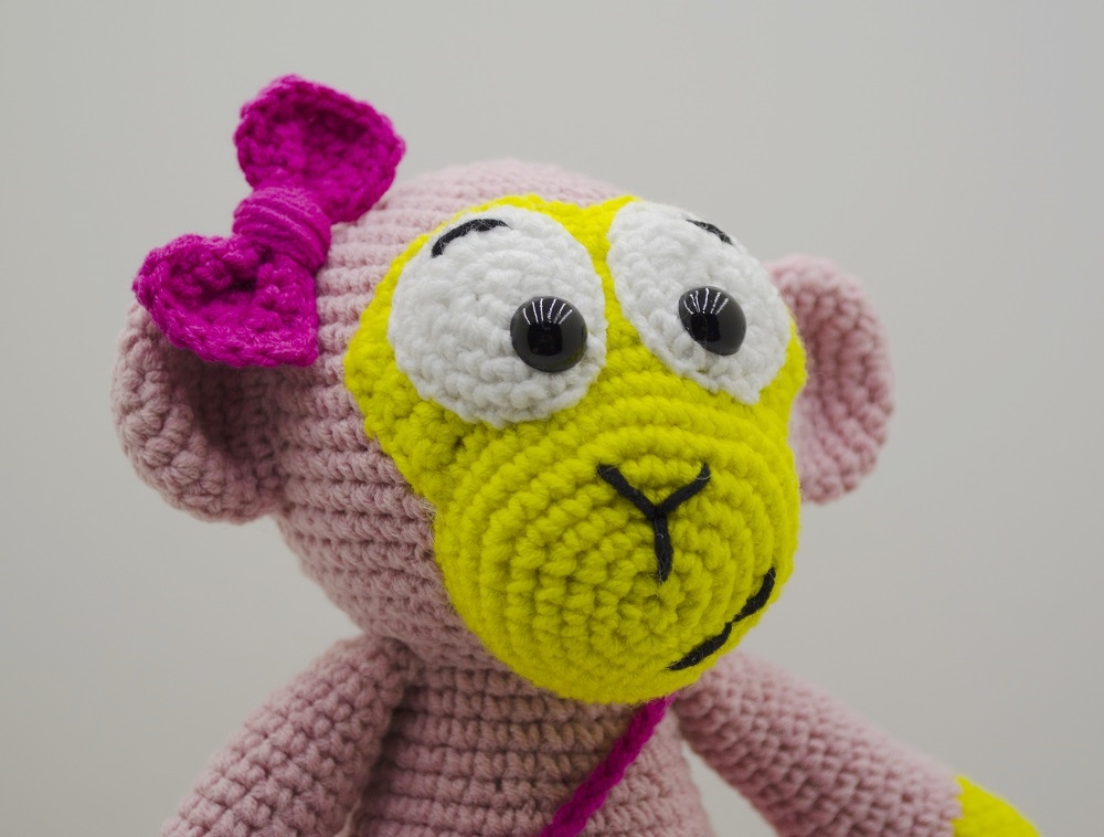crochet pink monkey close up