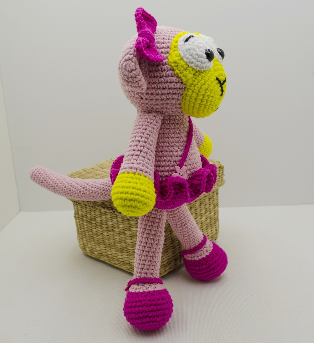 amigurumi pink monkey side view