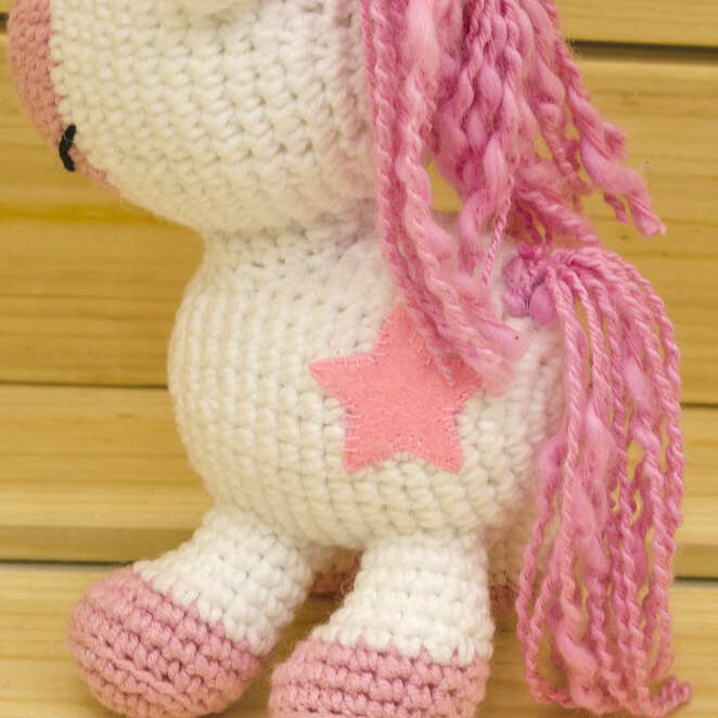 crochet pink unicorn close up