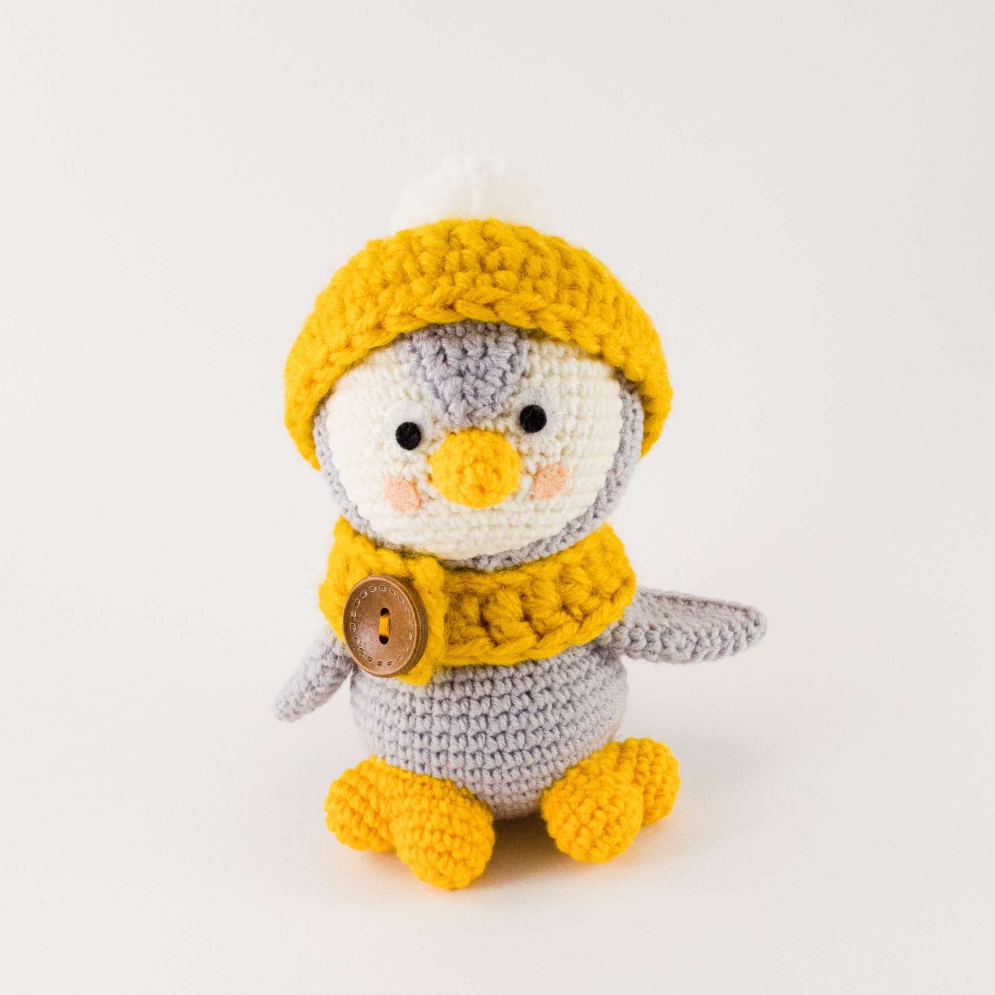 grey penguin with hat