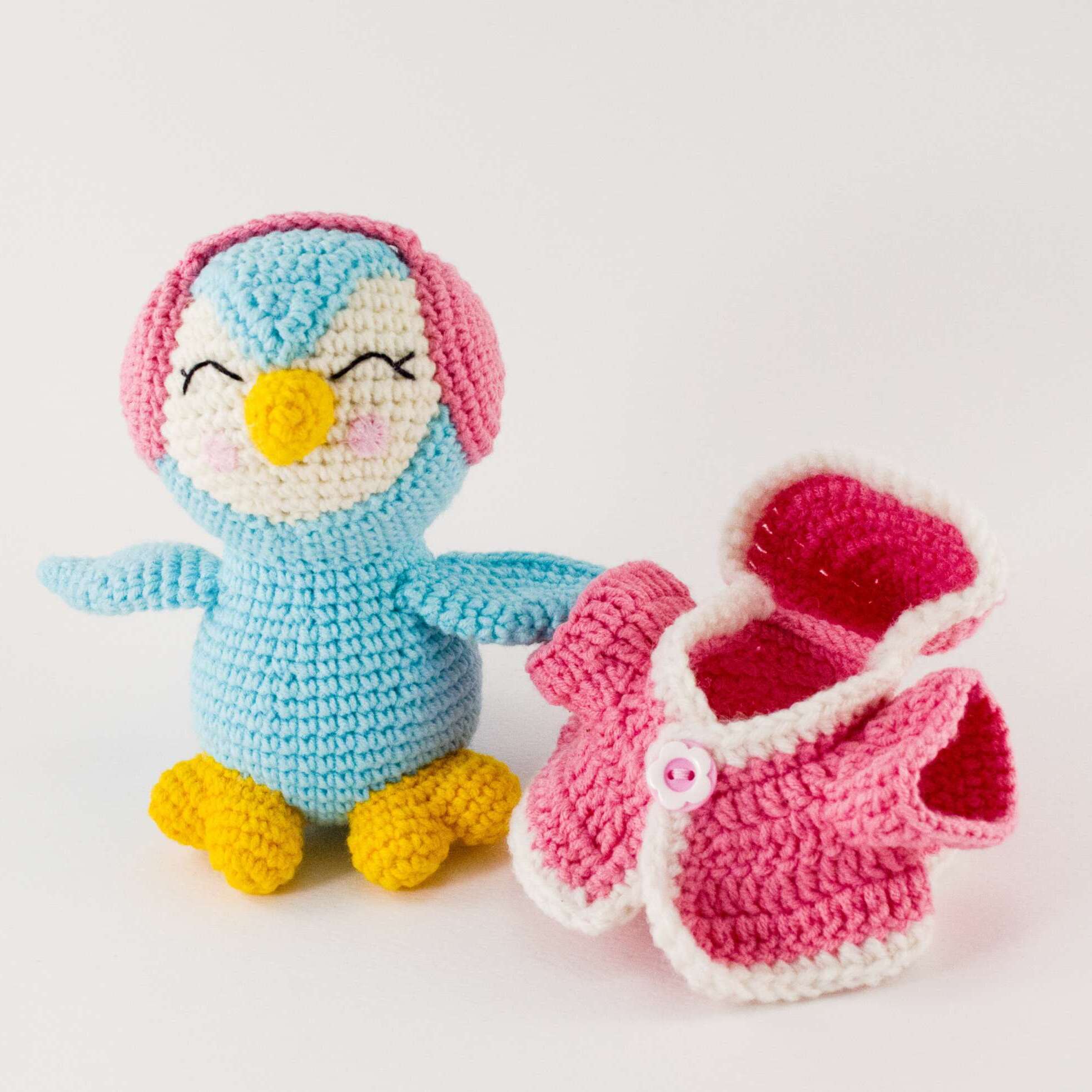 blue penguin in pink coat